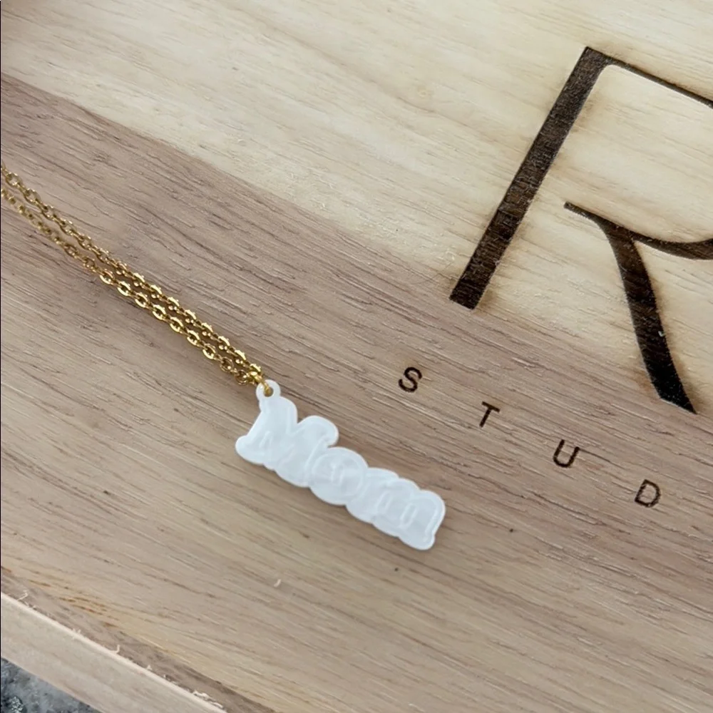Gold Necklace with White Crescent Pendant